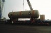 Several heavy drums  (max unit weight 200 tons) under loading at Aviles Port, Spain.  Destination Kazakhstan via Volga Rive 